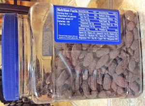 Picture of the nutrition facts label on a 37-ounce jar of Planters Cocoa Roasted Almonds, Dark Chocolate.  